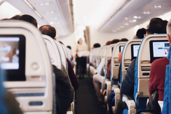 HOW TO SURVIVE A LONG FLIGHT:  15 TIPS